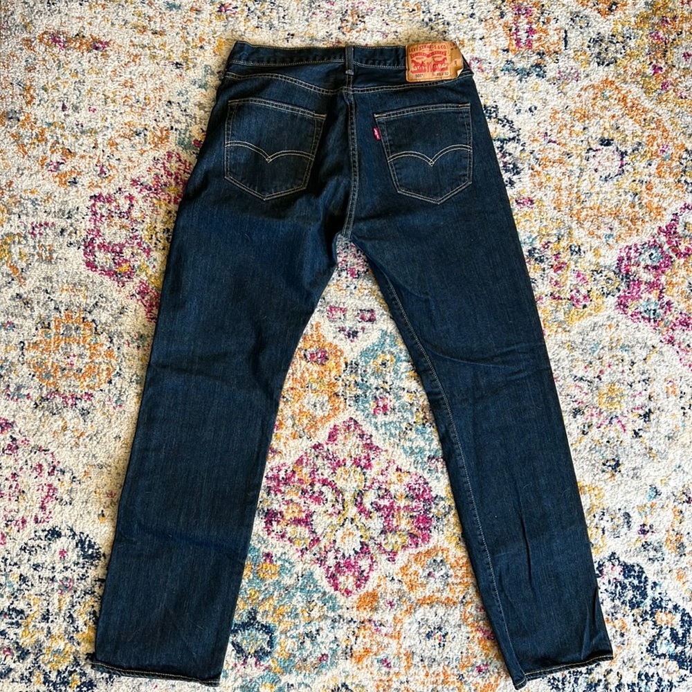Levi’s 501’s, dark wash.  Never been worn.  33x32. Excellent condition.